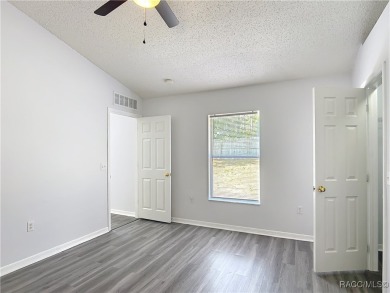 Discover the perfect blend of modern updates and move-in-ready on Citrus Springs Country Club in Florida - for sale on GolfHomes.com, golf home, golf lot