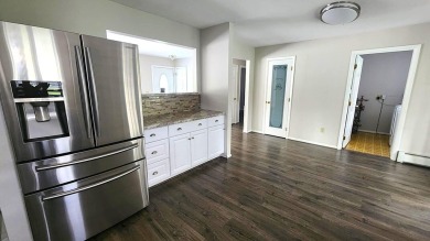Charming ranch style home situated on the 15th hole of White on White Deer Country Club in Michigan - for sale on GolfHomes.com, golf home, golf lot