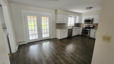 Charming ranch style home situated on the 15th hole of White on White Deer Country Club in Michigan - for sale on GolfHomes.com, golf home, golf lot