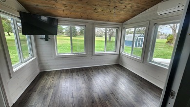Charming ranch style home situated on the 15th hole of White on White Deer Country Club in Michigan - for sale on GolfHomes.com, golf home, golf lot