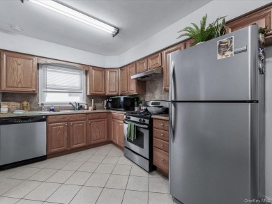 Exceptional opportunity in Douglaston! This spacious two-family on Douglaston Park Golf Course in New York - for sale on GolfHomes.com, golf home, golf lot
