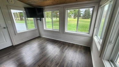 Charming ranch style home situated on the 15th hole of White on White Deer Country Club in Michigan - for sale on GolfHomes.com, golf home, golf lot