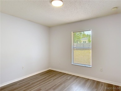 Discover the perfect blend of modern updates and move-in-ready on Citrus Springs Country Club in Florida - for sale on GolfHomes.com, golf home, golf lot