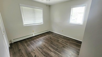 Charming ranch style home situated on the 15th hole of White on White Deer Country Club in Michigan - for sale on GolfHomes.com, golf home, golf lot