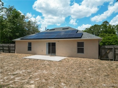 Discover the perfect blend of modern updates and move-in-ready on Citrus Springs Country Club in Florida - for sale on GolfHomes.com, golf home, golf lot