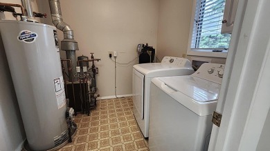 Charming ranch style home situated on the 15th hole of White on White Deer Country Club in Michigan - for sale on GolfHomes.com, golf home, golf lot