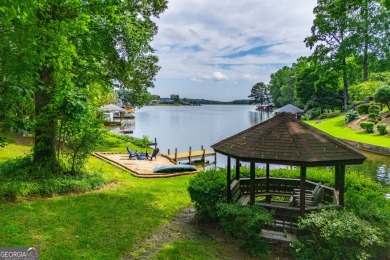 Charming Lakefront Cape Cod on the Ski Lake in Fairfield! on Fairfield Plantation Golf and Country Club in Georgia - for sale on GolfHomes.com, golf home, golf lot
