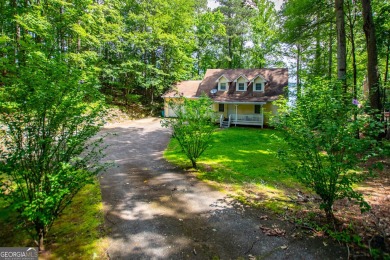 Charming Lakefront Cape Cod on the Ski Lake in Fairfield! on Fairfield Plantation Golf and Country Club in Georgia - for sale on GolfHomes.com, golf home, golf lot