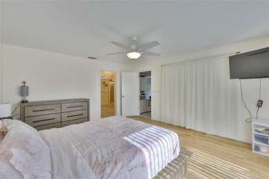 MOVE-IN READY and beautifully updated 2 bedroom, 2 bath expanded on Falcon Watch Golf Club in Florida - for sale on GolfHomes.com, golf home, golf lot