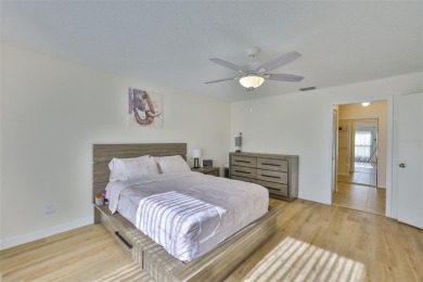 MOVE-IN READY and beautifully updated 2 bedroom, 2 bath expanded on Falcon Watch Golf Club in Florida - for sale on GolfHomes.com, golf home, golf lot