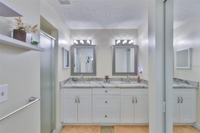 MOVE-IN READY and beautifully updated 2 bedroom, 2 bath expanded on Falcon Watch Golf Club in Florida - for sale on GolfHomes.com, golf home, golf lot