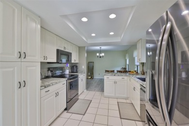 MOVE-IN READY and beautifully updated 2 bedroom, 2 bath expanded on Falcon Watch Golf Club in Florida - for sale on GolfHomes.com, golf home, golf lot