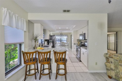 MOVE-IN READY and beautifully updated 2 bedroom, 2 bath expanded on Falcon Watch Golf Club in Florida - for sale on GolfHomes.com, golf home, golf lot