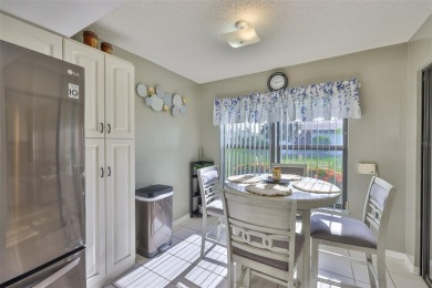 MOVE-IN READY and beautifully updated 2 bedroom, 2 bath expanded on Falcon Watch Golf Club in Florida - for sale on GolfHomes.com, golf home, golf lot