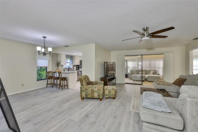 MOVE-IN READY and beautifully updated 2 bedroom, 2 bath expanded on Falcon Watch Golf Club in Florida - for sale on GolfHomes.com, golf home, golf lot