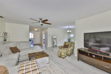 MOVE-IN READY and beautifully updated 2 bedroom, 2 bath expanded on Falcon Watch Golf Club in Florida - for sale on GolfHomes.com, golf home, golf lot