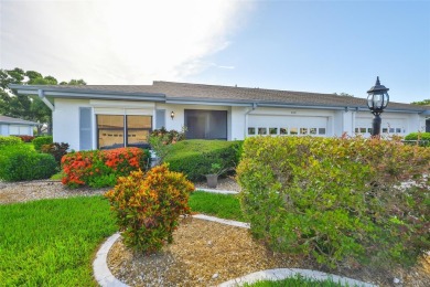 MOVE-IN READY and beautifully updated 2 bedroom, 2 bath expanded on Falcon Watch Golf Club in Florida - for sale on GolfHomes.com, golf home, golf lot