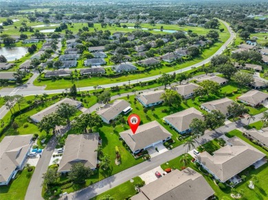 MOVE-IN READY and beautifully updated 2 bedroom, 2 bath expanded on Falcon Watch Golf Club in Florida - for sale on GolfHomes.com, golf home, golf lot