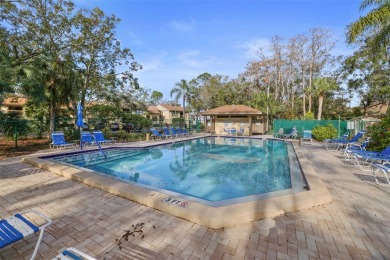 Looking for a 2 bedroom 2 bath 1st floor end unit condo? Well on East Lake Woodlands Country Club in Florida - for sale on GolfHomes.com, golf home, golf lot