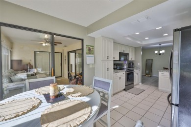 MOVE-IN READY and beautifully updated 2 bedroom, 2 bath expanded on Falcon Watch Golf Club in Florida - for sale on GolfHomes.com, golf home, golf lot