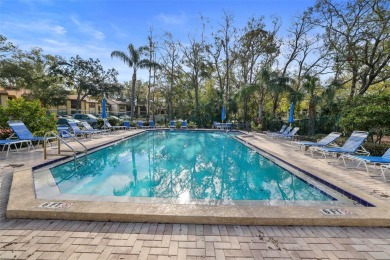 Looking for a 2 bedroom 2 bath 1st floor end unit condo? Well on East Lake Woodlands Country Club in Florida - for sale on GolfHomes.com, golf home, golf lot