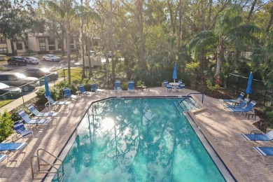 Looking for a 2 bedroom 2 bath 1st floor end unit condo? Well on East Lake Woodlands Country Club in Florida - for sale on GolfHomes.com, golf home, golf lot