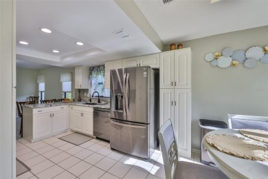 MOVE-IN READY and beautifully updated 2 bedroom, 2 bath expanded on Falcon Watch Golf Club in Florida - for sale on GolfHomes.com, golf home, golf lot