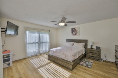 MOVE-IN READY and beautifully updated 2 bedroom, 2 bath expanded on Falcon Watch Golf Club in Florida - for sale on GolfHomes.com, golf home, golf lot