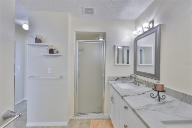 MOVE-IN READY and beautifully updated 2 bedroom, 2 bath expanded on Falcon Watch Golf Club in Florida - for sale on GolfHomes.com, golf home, golf lot