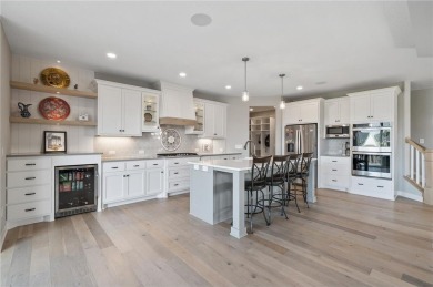This Hillcrest Sport, constructed by Hanson, is the residence on Sundance Golf and Bowl in Minnesota - for sale on GolfHomes.com, golf home, golf lot