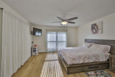 MOVE-IN READY and beautifully updated 2 bedroom, 2 bath expanded on Falcon Watch Golf Club in Florida - for sale on GolfHomes.com, golf home, golf lot