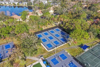 Looking for a 2 bedroom 2 bath 1st floor end unit condo? Well on East Lake Woodlands Country Club in Florida - for sale on GolfHomes.com, golf home, golf lot