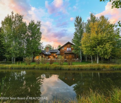 Set on 0.59 acres, this Carney Logan Burke-designed cabin offers on 3 Creek Ranch Golf Club in Wyoming - for sale on GolfHomes.com, golf home, golf lot