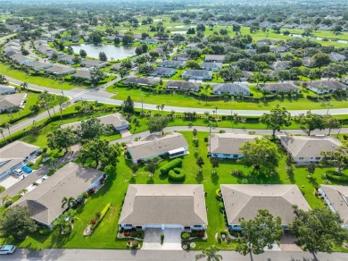MOVE-IN READY and beautifully updated 2 bedroom, 2 bath expanded on Falcon Watch Golf Club in Florida - for sale on GolfHomes.com, golf home, golf lot