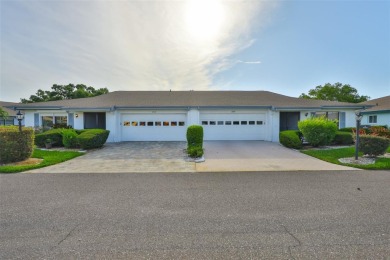 MOVE-IN READY and beautifully updated 2 bedroom, 2 bath expanded on Falcon Watch Golf Club in Florida - for sale on GolfHomes.com, golf home, golf lot