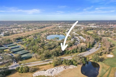 Looking for a 2 bedroom 2 bath 1st floor end unit condo? Well on East Lake Woodlands Country Club in Florida - for sale on GolfHomes.com, golf home, golf lot