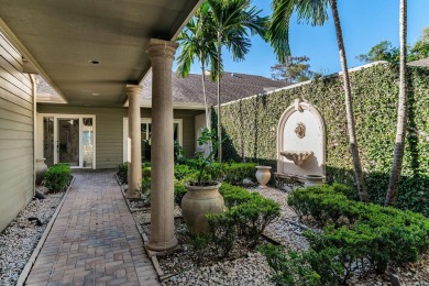 Enjoy serene lake views from this beautiful villa in the on Wyndemere Country Club in Florida - for sale on GolfHomes.com, golf home, golf lot