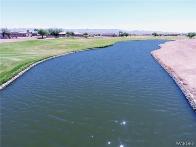 Premium golf course lot over looking lake on the 17th green on El Rio Golf and Country Club in Arizona - for sale on GolfHomes.com, golf home, golf lot