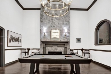 A modern French Chateau in Parkland's most exclusive enclave on Parkland Golf Club in Florida - for sale on GolfHomes.com, golf home, golf lot