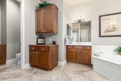 Stunning luxury home in the coveted Active Adult Trilogy on Trilogy Golf Club At Power Ranch in Arizona - for sale on GolfHomes.com, golf home, golf lot