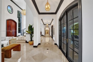 A modern French Chateau in Parkland's most exclusive enclave on Parkland Golf Club in Florida - for sale on GolfHomes.com, golf home, golf lot
