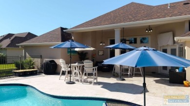 Beautiful 4-bedroom, 3.5-bath home on Ocelot Trail in Laguna on South Padre Island Golf Club in Texas - for sale on GolfHomes.com, golf home, golf lot