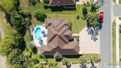 Beautiful 4-bedroom, 3.5-bath home on Ocelot Trail in Laguna on South Padre Island Golf Club in Texas - for sale on GolfHomes.com, golf home, golf lot
