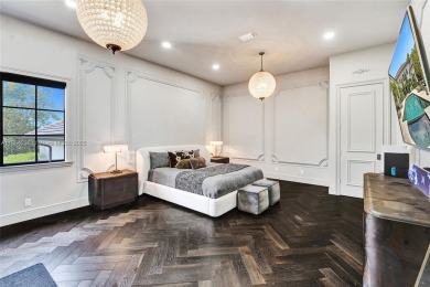 A modern French Chateau in Parkland's most exclusive enclave on Parkland Golf Club in Florida - for sale on GolfHomes.com, golf home, golf lot