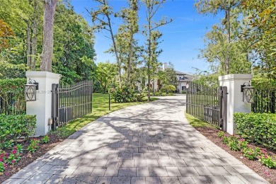 A modern French Chateau in Parkland's most exclusive enclave on Parkland Golf Club in Florida - for sale on GolfHomes.com, golf home, golf lot