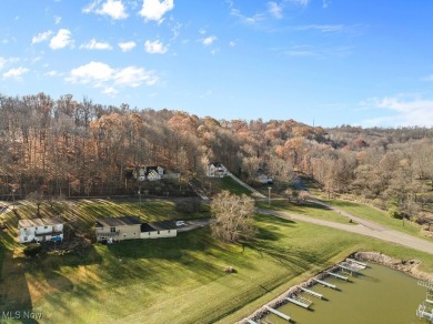 Wow! Stunning custom-built home with amazing lake views on a on Lake Mohawk Golf Club in Ohio - for sale on GolfHomes.com, golf home, golf lot