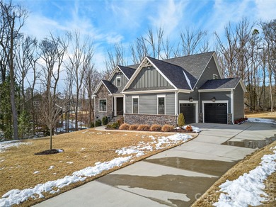 Refined custom construction meets elevated golf-course living in on Club At Irish Creek in North Carolina - for sale on GolfHomes.com, golf home, golf lot