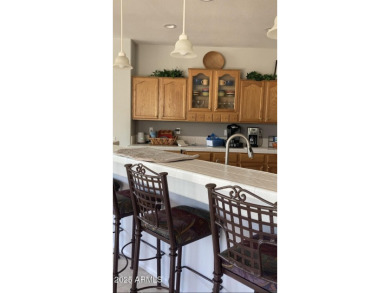 Lovely Stonecrest retreat with HEATED POOL & SPA w/pop ups for on Desert Springs Golf Course in Arizona - for sale on GolfHomes.com, golf home, golf lot