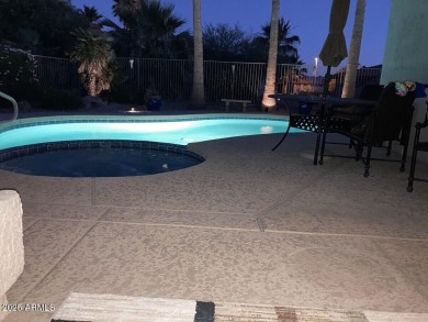 Lovely Stonecrest retreat with HEATED POOL & SPA w/pop ups for on Desert Springs Golf Course in Arizona - for sale on GolfHomes.com, golf home, golf lot