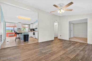 Come home to your beach getaway. This two bedroom, two flex on Oyster Bay Golf Links in North Carolina - for sale on GolfHomes.com, golf home, golf lot